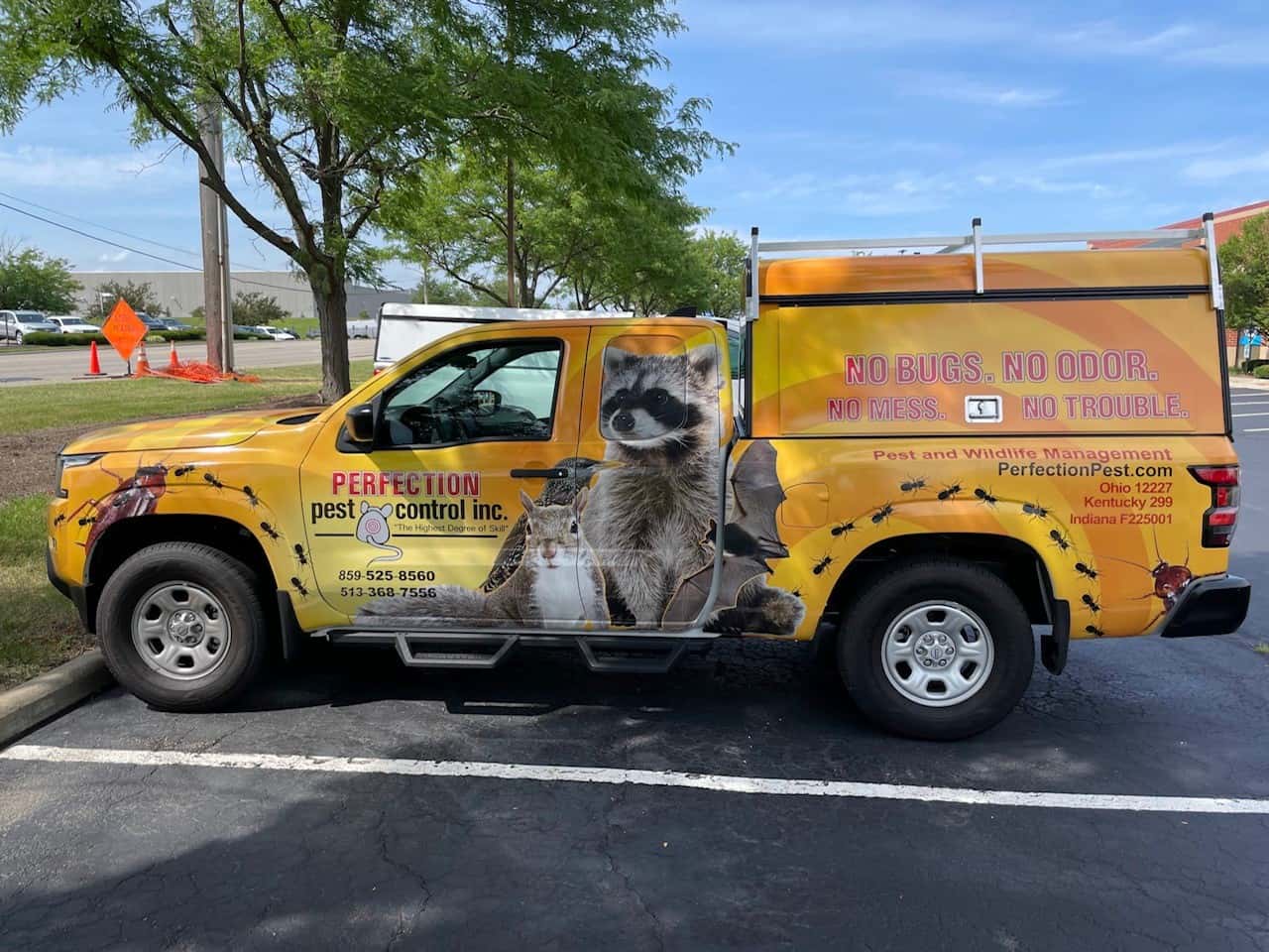 Perfection Pest Control wrapped service truck